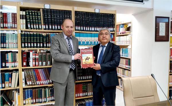 Kyrgyz Ambassador and ECI President Meet- ECI Library Receives Book Donation