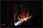 Istanbul's Fatih Sultan Mehmet Bridge Illuminated in Orange Lights