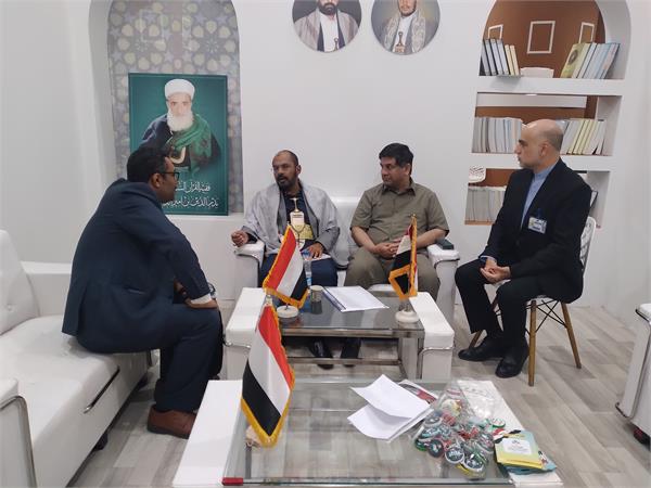 میزبانی غرفه یمن از دکتر سعدخان رئیس موسسه فرهنگی اکو